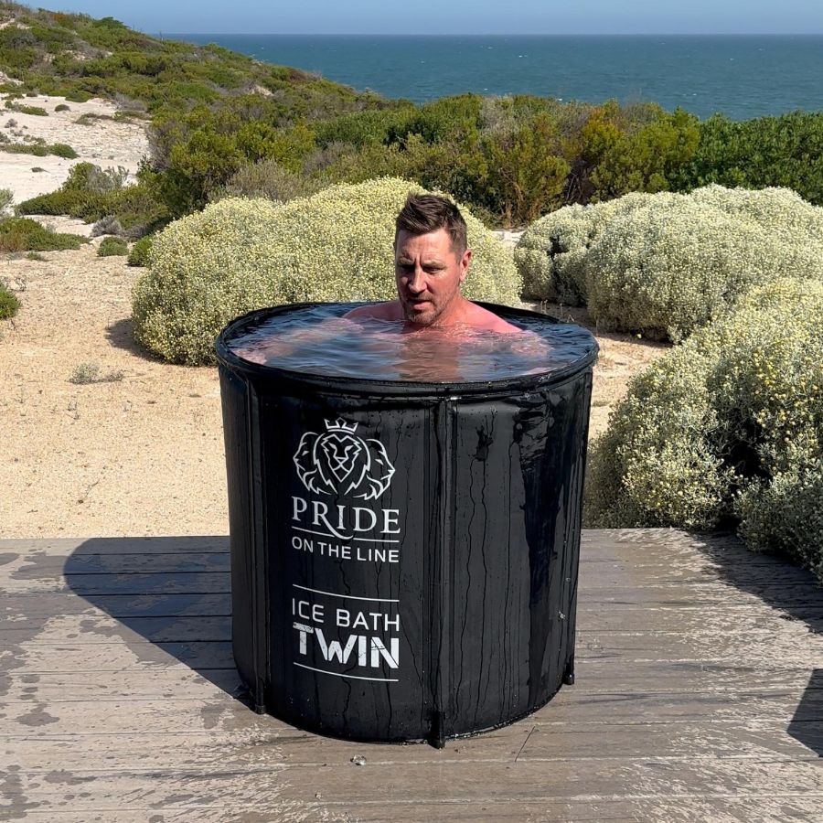 Pride On The Line Portable Recovery Twin Ice Bath Man Submerged With Sea In Background